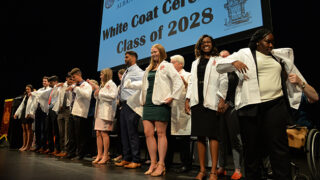 Albany Medical College students don their white coats for the first time