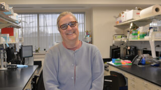 Breast cancer researcher Margarida Barroso, PhD standing in a lab