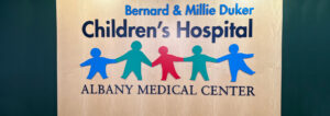 The Bernard & Millie Duker Children's Hospital wall logo